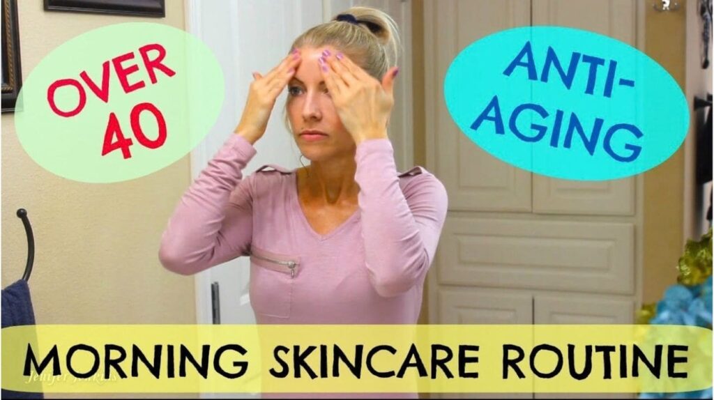 Woman applying moisturizer on face during morning skincare routine for women over 40 with anti-aging skincare tips.